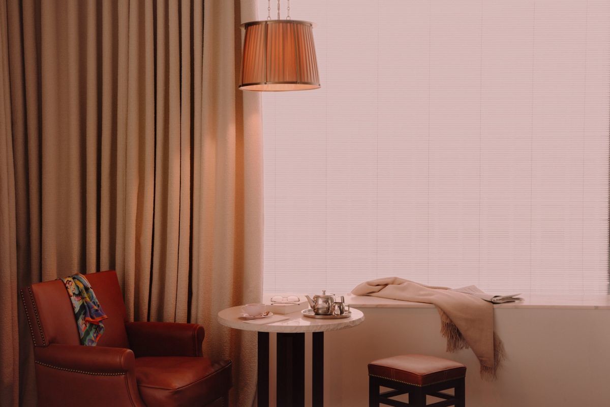 Window lounge area with vintage leather armchair