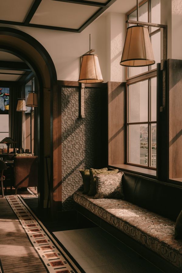 Window seat banquette with natural light and view